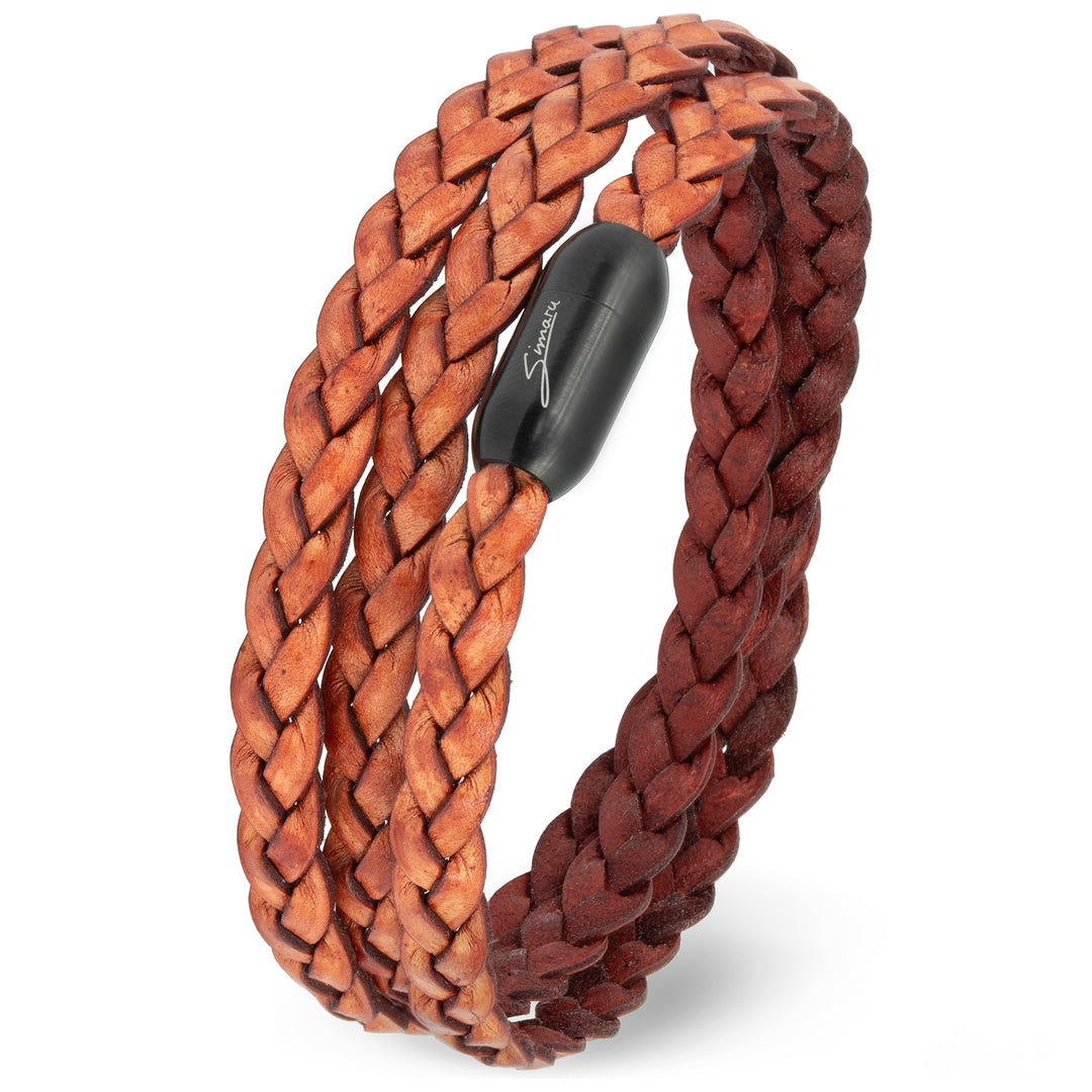 Geflochtenes Lederarmband in Rostbraun aufgewickelt stehend mit schwarzem Magnetverschluss